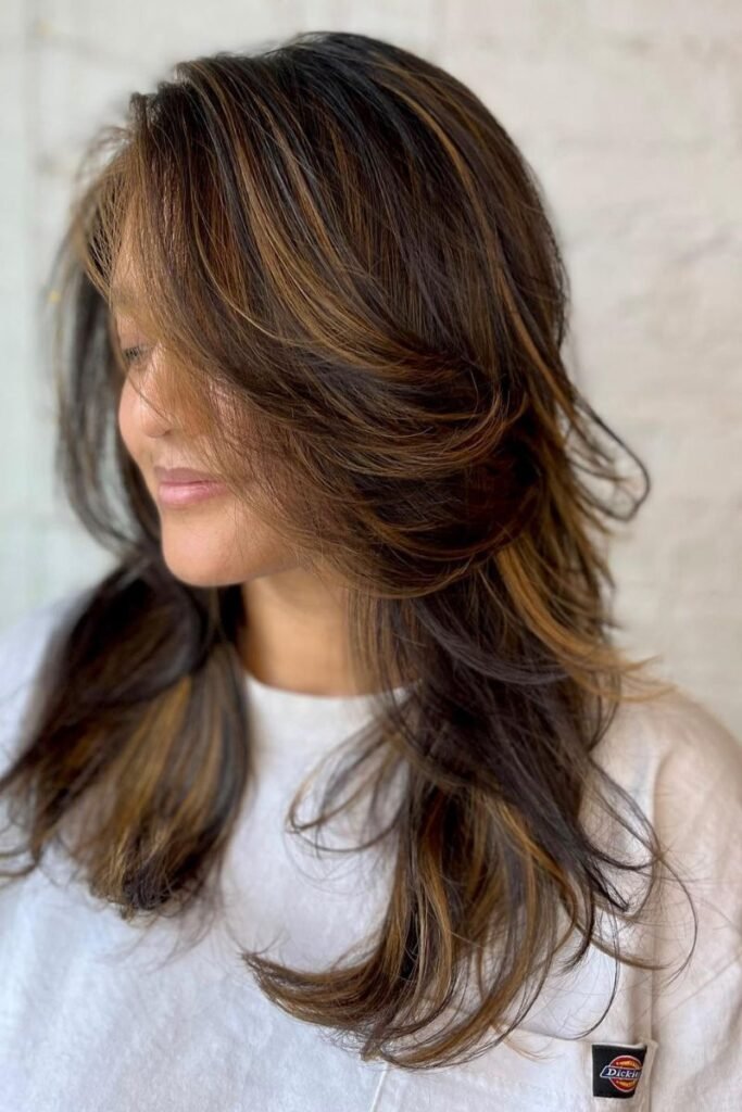 Long Layers with Caramel Tips and Face-Framing Highlights