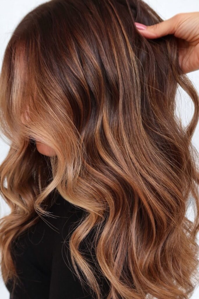 Long wavy layered with balayage highlights