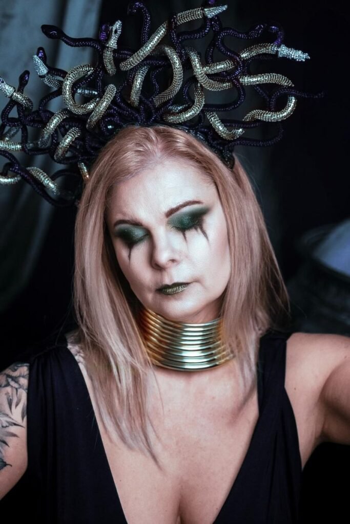 Medusa snake crown with sleek shoulder-length blonde hair