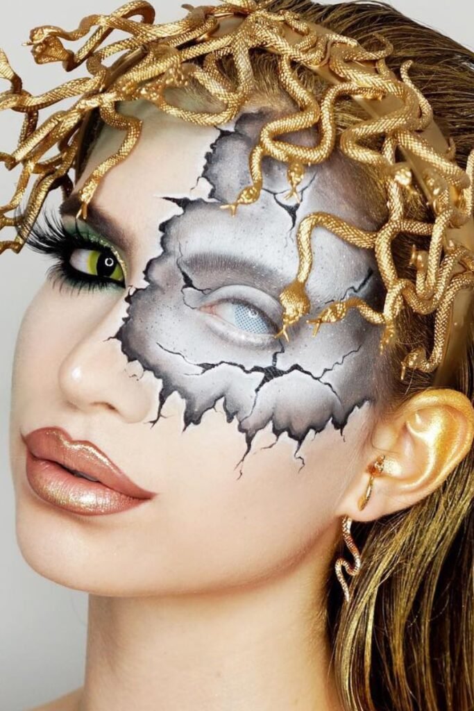 Medusa with gold serpentine accents and sleek wet look