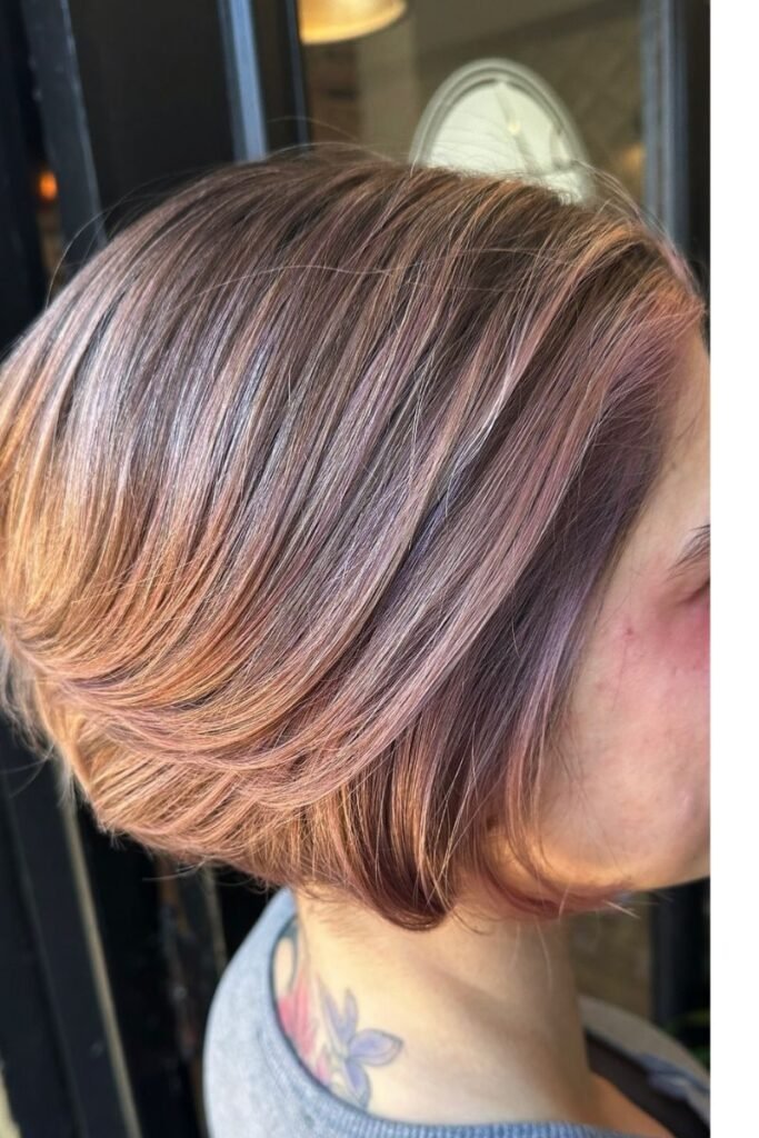 Rose Gold Bob with Soft Layers and Shiny Finish