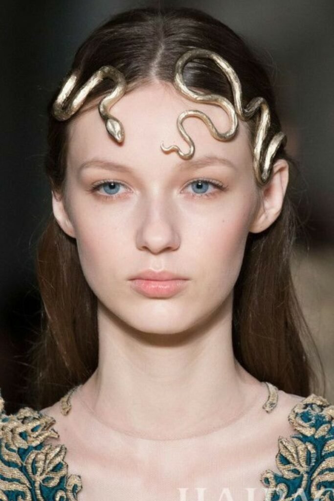 Sleek straight Medusa style with metallic snake headpiece