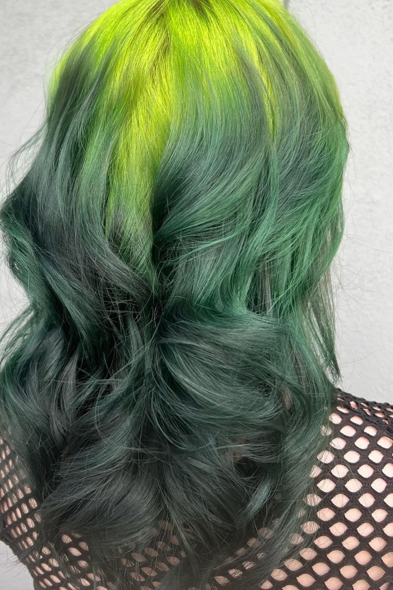 Tousled waves with green ombre and neon roots