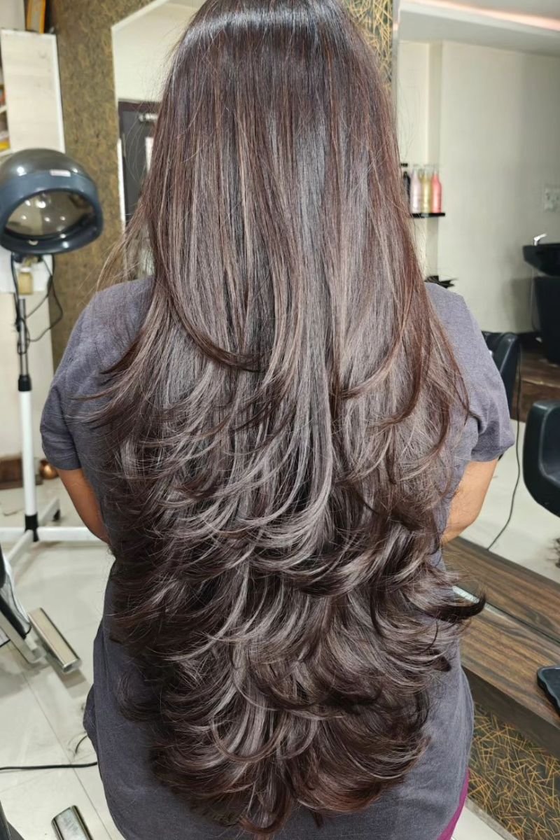 layered octopus cut featuring long, wavy or curly layers 