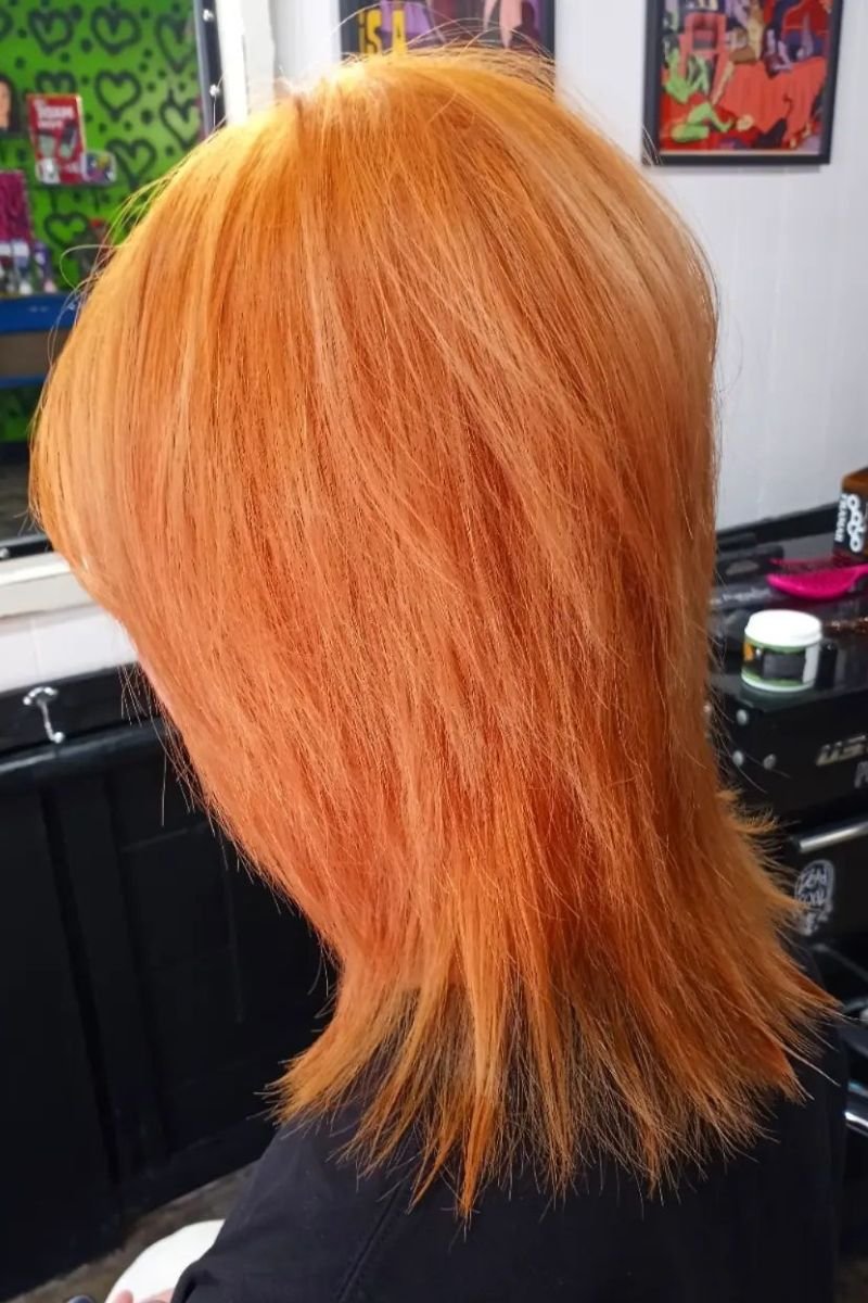 layered octopus cut with vibrant orange highlights