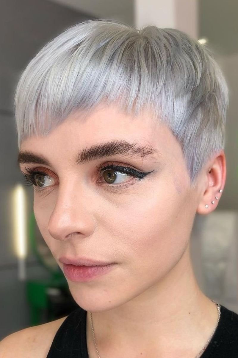 micro pixie haircut with baby bangs