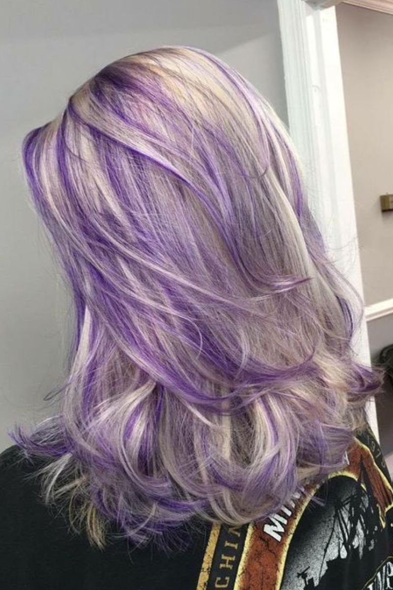 Ash blond and purple hair wolf cut