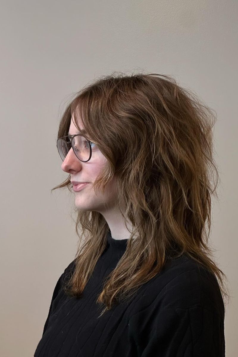 Medium-length shag with curtain bangs