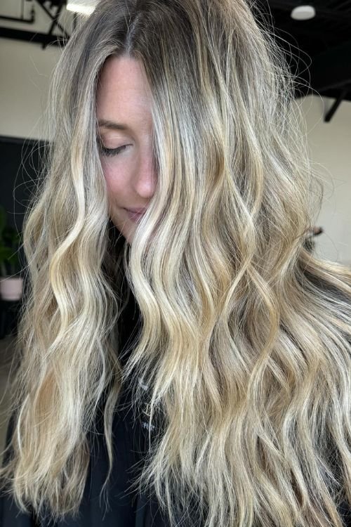 Old Money Blonde with soft waves and natural highlights