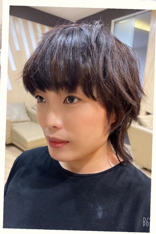 Shaggy Bob Wolf Cut with Full Bangs