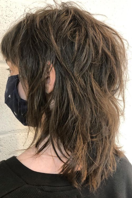 Soft mullet with shaggy layers tousled texture and wispy ends