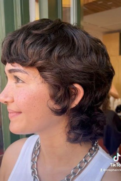 Soft mullet with tousled layers and short textured bangs