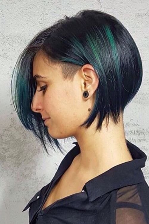 Undercut bob with side part and green-blue highlights