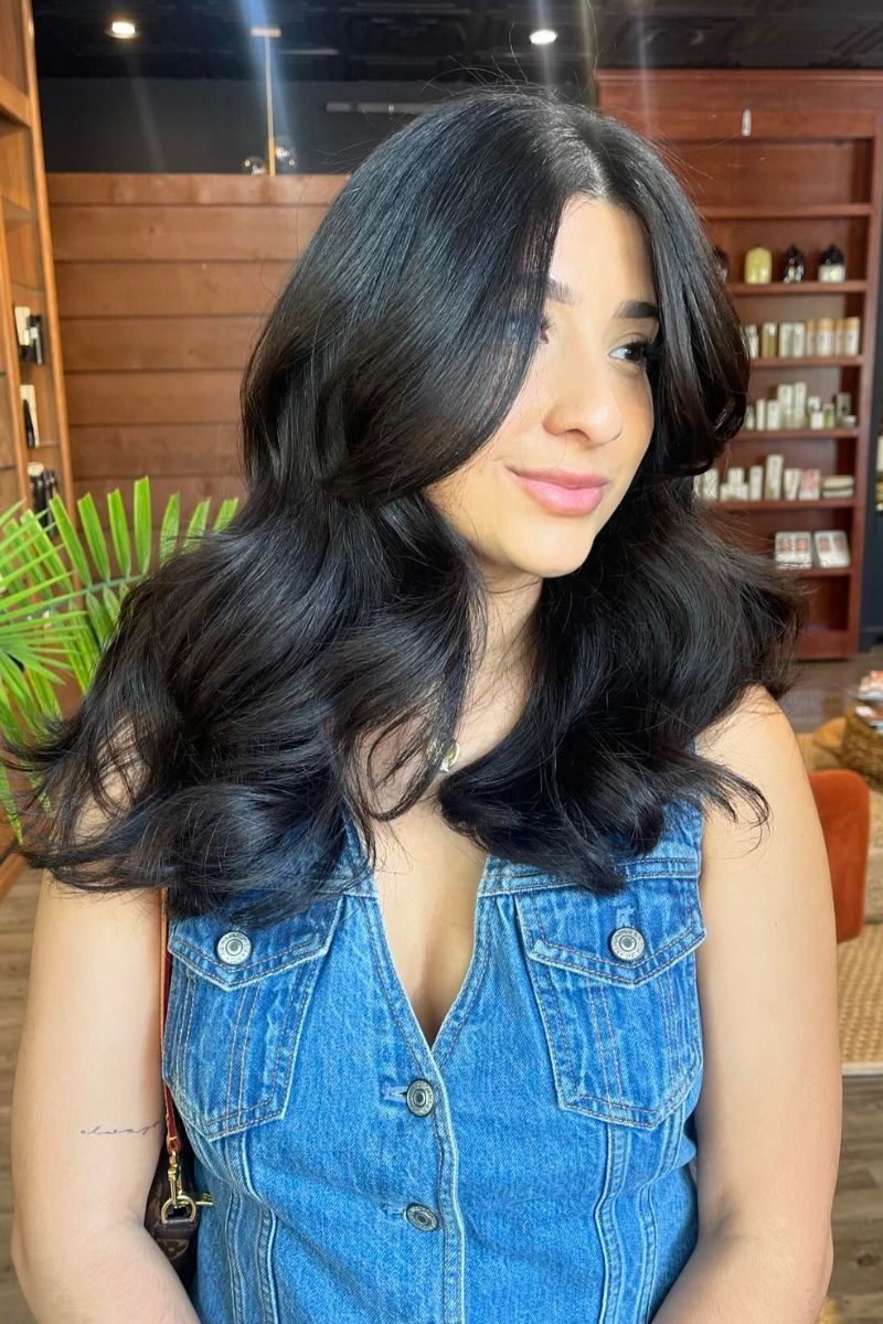 Voluminous Layered Waves with Curtain Bangs