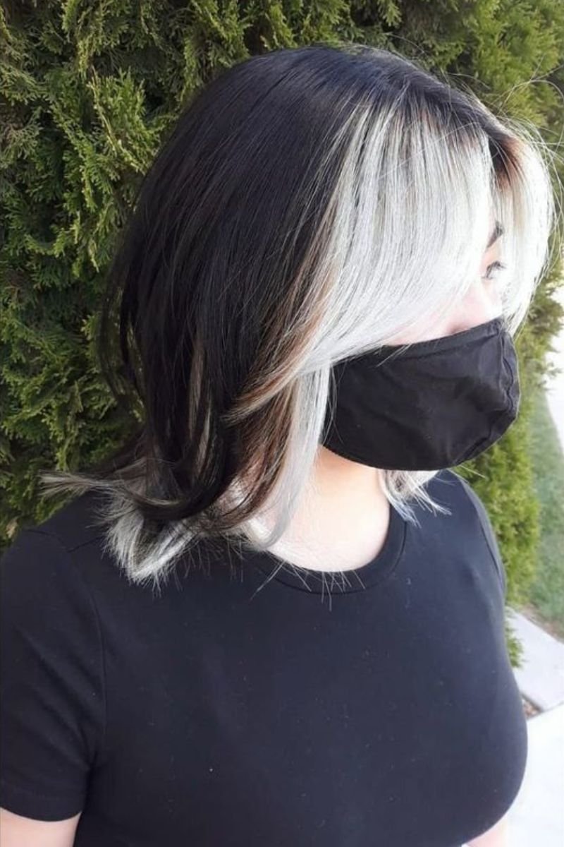  silver blonde highlights on a black wolf cut