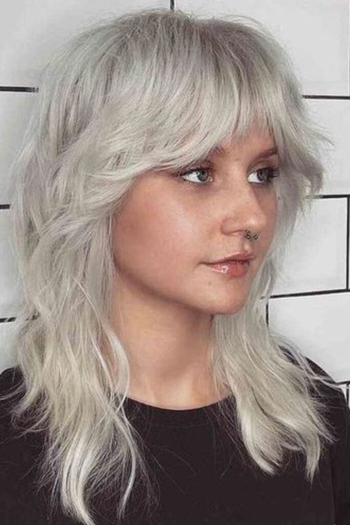 wolf cut with shaggy, textured layers