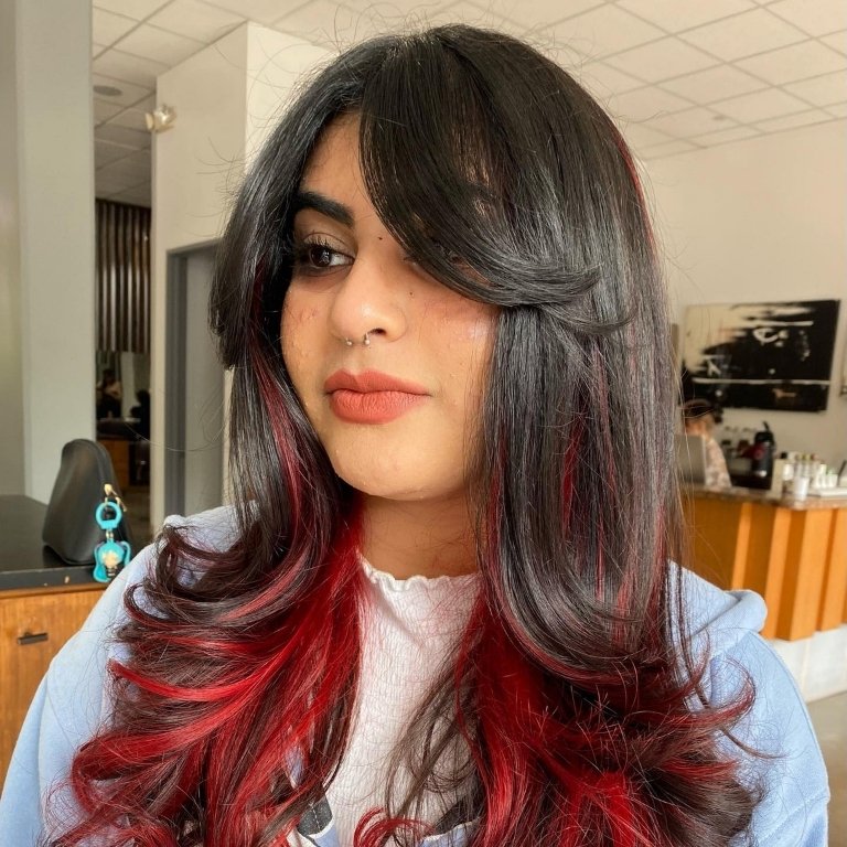 Layered Waves with Bold Red Tips