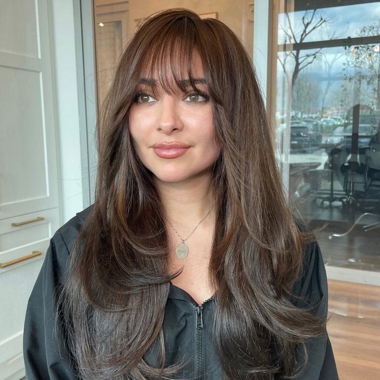 Long Layered Hair with Wispy Bangs