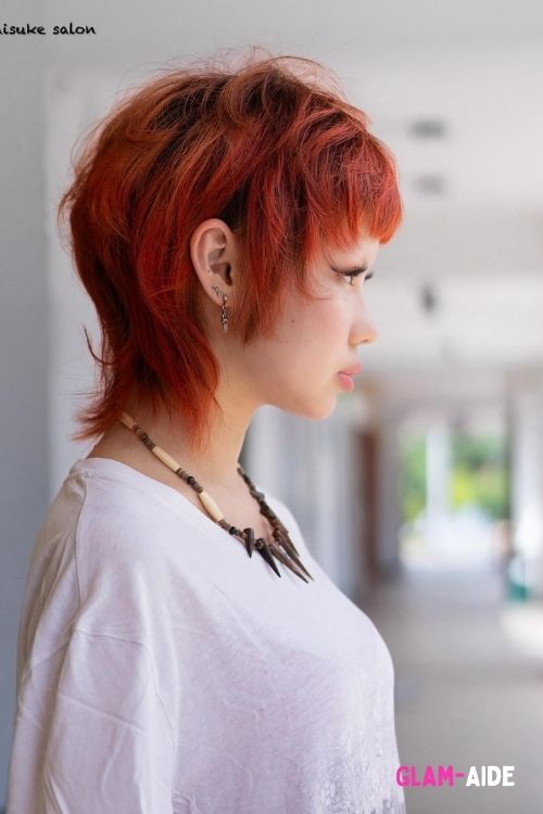 Pixie Wolf Cut with Shaggy Layers and Fiery Red Color