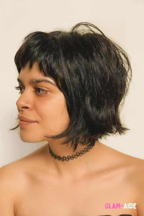 Razor cut bob with choppy layers and micro bangs