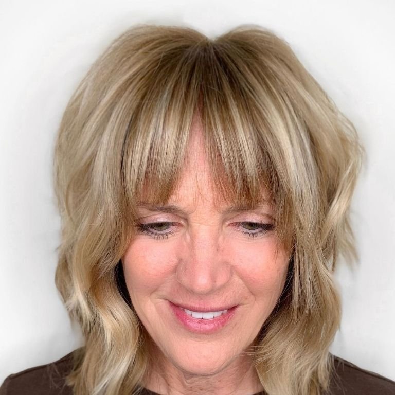 Shoulder-Length Shag with Wispy Bangs