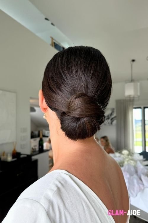 Sleek low bun short hair