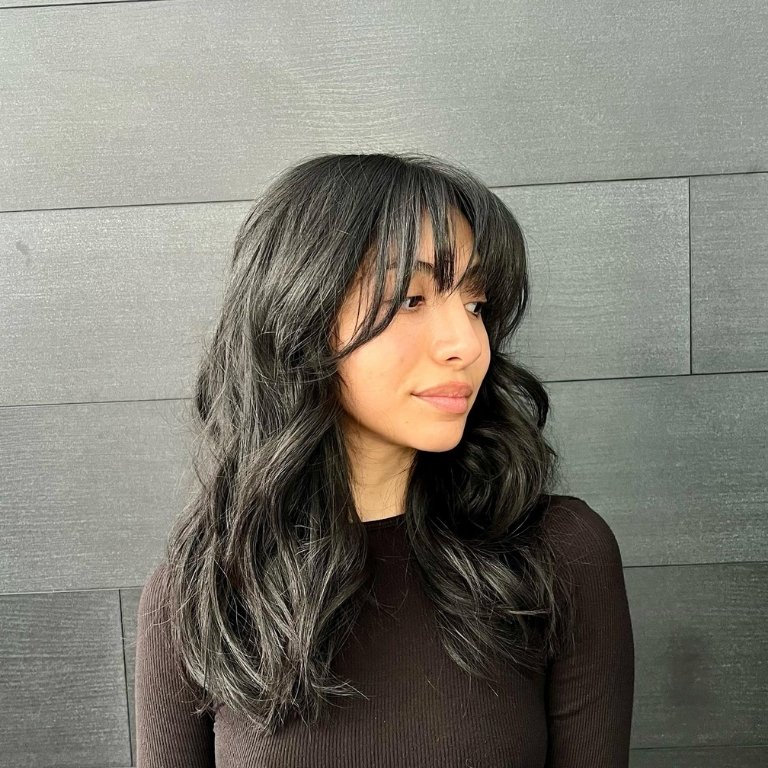 Wavy Layers with Wispy Bangs